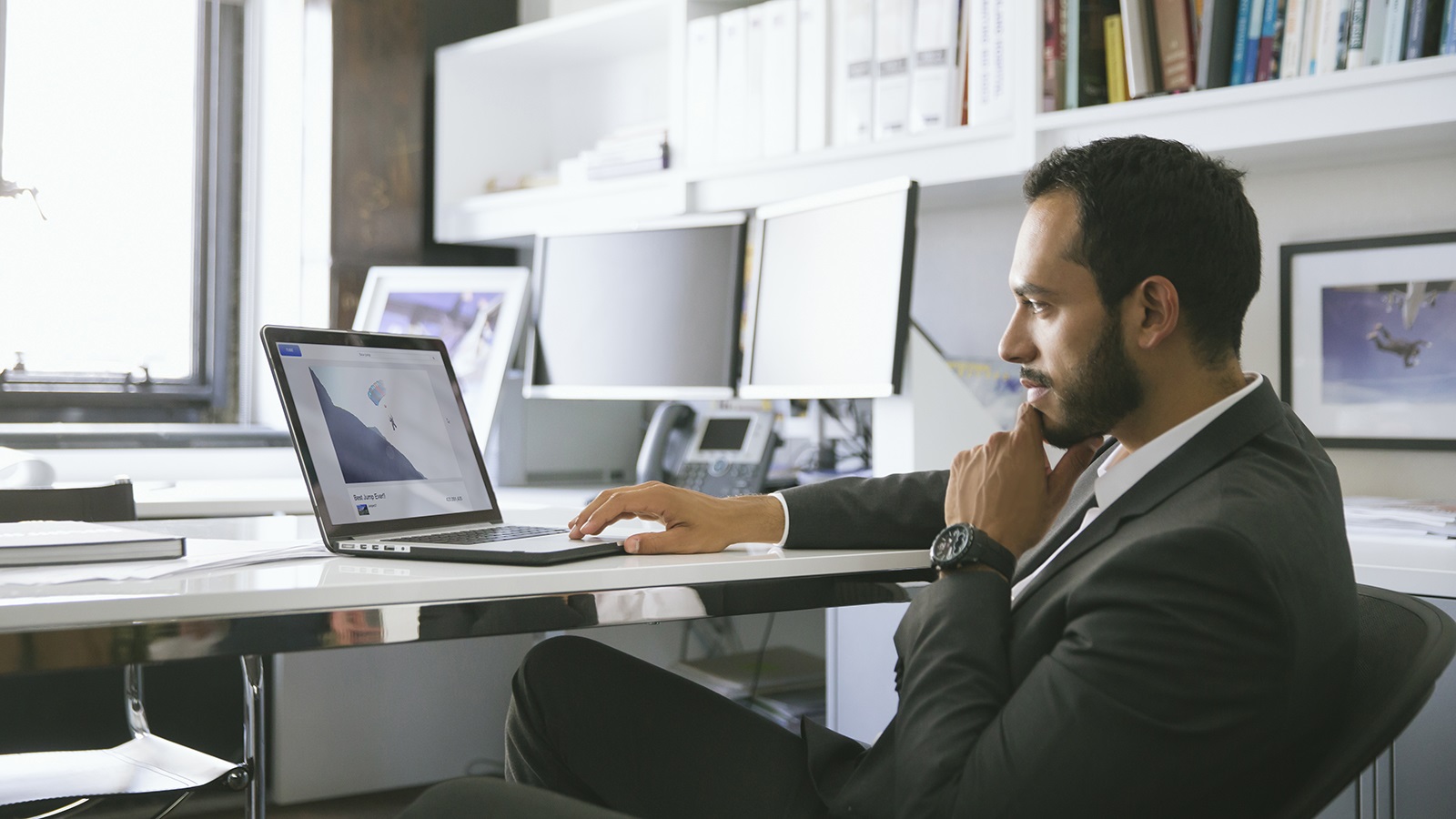 Los Angeles and San Francisco Advertising Portrait Photographer Marc Olivier Le Blanc, Advertising, Editorial and Lifestyle. Man at desk using laptop.