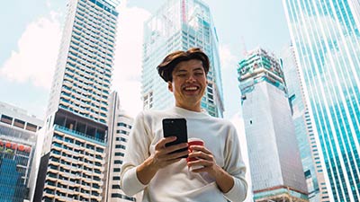 Looking on the smartphone in the streets
