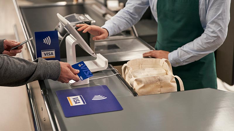 Tapping contactless card at a merchant