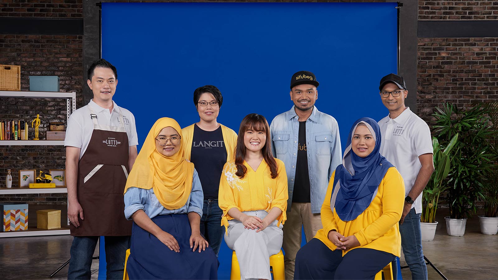 A group of individuals sporting yellow and blue clothing, emphasizing the significance of supporting local businesses. 